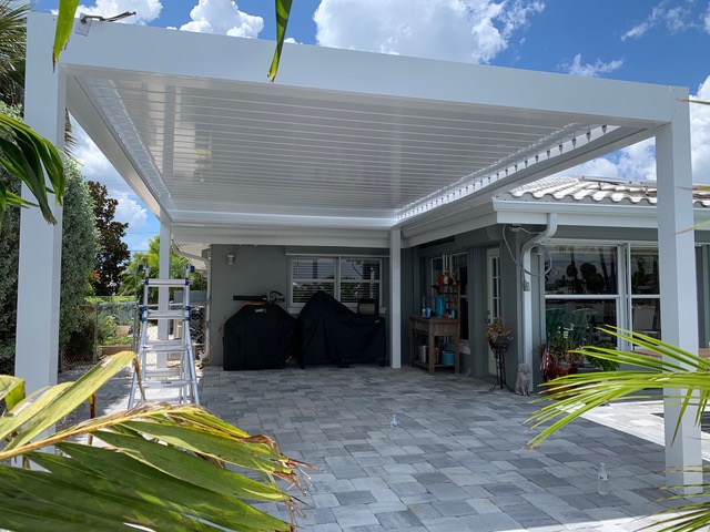 motorized pergola over Florida backyard patio